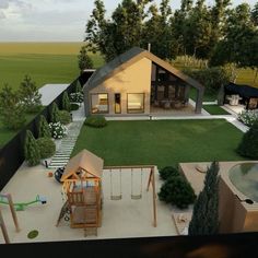 an aerial view of a house with a playground