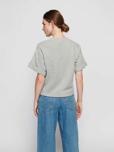 An oversized sweatshirt-tee with rolled boxy cuffs and an effortlessly relaxed fit. Perfect for those sunny spring days that's kinda cool, but kinda warm… (This one comes in Heather Grey.) | Women's Bane Sweatshirt in Heather Grey | Ethical Essentials Wrap Clothing, Nation Ltd, Smooth Face, Cashmere Accessories, Pullover Cardigan, Belted Jacket, Long Midi Dress, Cashmere Turtleneck, Short Mini Dress