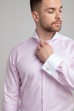 Introducing our Extreme Cutaway Pink Premium Contrast Shirt, featuring a contrasting white collar and cuffs and accented with Mother of Pearl buttons. Whether it's for work or a formal occasion, this shirt is sure to make a statement. Classic Long Sleeve Shirt With Contrast Collar, Formal Fitted Tops With Embroidered Cuffs, Elegant Tops With Embroidered Cuffs, Classic Business Shirt With Cuffed Sleeves, White Shirt With Button Cuffs And Fold-down Collar, Classic Shirt With Cuffed Sleeves And Collar, Fitted Shirt With Contrast Collar, Fitted Shirt With Contrast Collar For Work, Formal Fitted Tops With Contrast Collar