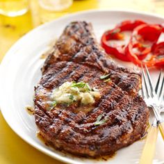 a plate with steak and vegetables on it