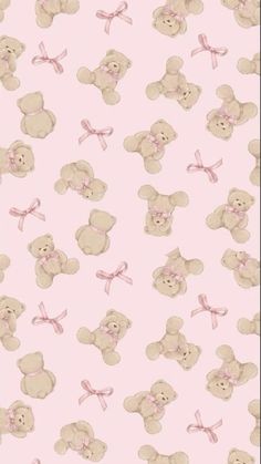 a pink wallpaper with teddy bears and bows on it's head is shown