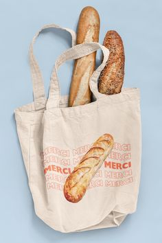 Add a touch of Parisian charm to your daily errands with our adorable Merci Baguette canvas tote bag inspired by the iconic "thank you" takeout bags, this tote brings a playful French flair to your shopping trips and everyday activities. Crafted from 100% cotton canvas, this bag measures 15" x 16", offering the perfect size for carrying groceries, books, or daily essentials. The heavy-duty fabric ensures durability and long-lasting use. Featuring sturdy 20" handles made from the same robust canvas, this tote is easy to carry, even with a week's worth of shopping. The sewn-in label adds a touch of quality to this functional accessory. Whether you're heading to the market or strolling through town, this charming tote combines practicality with a sprinkle of Parisian chic! French Grocery, Parisienne Chic, Shopping Totes, Graphic Design Fun, Market Tote, Functional Accessories, Everyday Activities, Parisian Chic, Daily Essentials