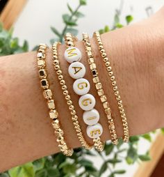 "Bracelet Set | Sparkly Gold Beaded Bracelet | 3mm 4mm Gold Filled Bead Bracelet | Layering Gold Bracelets | Stackable Bracelets | Faceted Gold Filled Beads ❥ These bracelets are so pretty and sparkly and are perfect to wear alone or add to a stack for layering. Mix up your stack with these and plain beaded bracelets! CHOOSE: - 1 small 3mm beaded bracelet - 1 larger 4mm beaded bracelet - Both bracelets -1 small and 1 large ❥ Every bracelet order comes wrapped and includes a jewelry cleaning clot Word Bracelet Beads Ideas, Layering Gold Bracelets, Gold Beaded Bracelets, Beaded Name Bracelet, Gold Layered Bracelets, Stackable Beaded Bracelets, Clay Bracelets, Bracelet Layering, Gold Beaded Bracelet