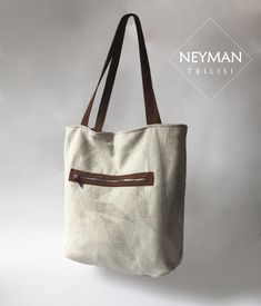 This beige thick canvas furniture textile bag is highly durable and comfortable for every day use. Its simple design makes it perfect for any and every occasion like work, shopping, beach, going out etc. The bag is really very roomy, so you can use it as travel bag as well. The combination of beige canvas and brown vegan suede leather elements gives the bag a unique look. The wide handles comfortably fit your shoulders. It has a big side pocket with zipper. The medium inner pocket is perfect for Beige Tote Canvas Bag With Zipper Closure, Neutral Rectangular Canvas Bag For Everyday Use, Rectangular Neutral Canvas Bag For Everyday Use, Everyday Use Neutral Rectangular Canvas Bag, Modern Beige Canvas Bag With Large Capacity, Modern Large Capacity Beige Canvas Bag, Neutral Canvas Bag For Daily Use, Beige Bags With Canvas Lining For Daily Use, Cream Canvas Bag With Zipper Closure