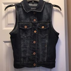 Maurices Dark Denim Vest With Button Closure Down Front And 2 Front Pockets With Button Closures Size Small 70% Cotton 28% Polyester 2% Spandex Excellent Like New Condition Looks Brand New Smoke Free Home Casual Button-up Denim Vest With Button Closure, Medium Wash Casual Denim Vest With Buttons, Casual Medium Wash Denim Vest With Buttons, Fitted Casual Denim Vest With Buttons, Casual Fitted Denim Vest With Buttons, Fitted Button-up Casual Denim Vest, Casual Dark Wash Denim Vest With Buttons, Fitted Button-up Denim Vest, Trendy Dark Wash Denim Vest With Buttons