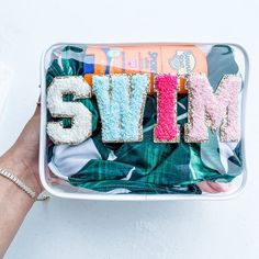 This cute Clear Pink Letter Patch Swim Bag is ideal for when traveling, a day at the pool, a relaxing beach day or for any type of occasion ! This perfectly sized bag measure 7.5 x 5.5 x 2.2 The clear bag comes in one color, pink, letter patches are sorted and randomly picked out. Can be Preppy Room Beach, Preppy Studying, Teen Essentials, Summer Bags Beach, Preppy Travel, Preppy Accessories, Clear Pouch, Swim Bag, Preppy Bags