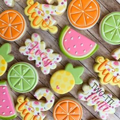 some decorated cookies are sitting on a table