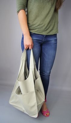 "Leather hobo purse Hobo bag Classic slouchy hobo purse beige leather Soft Natural Leather Large Capacity Every Day Bag Weekender bag Light grey oversized bag - large leather tote bag. Unikque model. Large and stylish tote bag made from high quality leather. Spacious interior provides room for all the daily essentials and more. It is large enough to hold all your weekend essentials. This bag is perfect as your everyday bag, which can fit an IPAD, A4 files, books, magazines, cosmetic bag as well Everyday Double Handle Hobo Bag With Pockets, Hobo Bucket Bag With Adjustable Strap For Errands, Travel Canvas Hobo Bag With Pockets, Everyday Hobo Bag With Large Capacity, Versatile Everyday Hobo Bag With Pockets, Large Capacity Hobo Bag For Errands, Everyday Large Capacity Hobo Bag, Daily Use Bucket Hobo Bag With Pockets, Daily Use Hobo Bucket Bag With Pockets