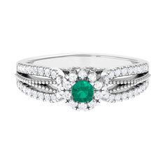 Product Details This Solid Gold Ring features a dazzling round emerald center and diamond accents, with captivating beaded details. Its split shank halo design is sure to turn heads. Product Information SKU SHP-RINGS0821211024 Width 6 mm Height 6.5 mm Weight 3.86 gm (Approximate) EMERALD INFORMATION No.of Stones 1 Pieces Total Weight 0.31 Carat (Approximate) Dimension(approx) Round-4X4 mm-1 Pcs Color Green Cut Brilliant Shape Round Setting Type Accent Quality Grade AAA DIAMOND INFORMATION No.of Stones 48 Pieces Total Weight 0.69 Carat (Approximate) Dimension(approx) Round-1.20X1.20 mm-38 PcsRound-1.35X1.35 mm-10 Pcs Color HI Cut Brilliant Shape Round Setting Type Accent Quality Grade SI View More Product Parent Collection Handle emerald-rings Halo Design, Solid Gold Ring, 18k Yellow Gold Ring, Solid Gold Rings, Split Shank, Designer Engagement Rings, Emerald Ring, Yellow Gold Rings, Gold Ring