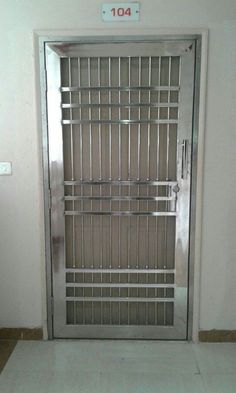 a door with bars on it and a sign that says 1014