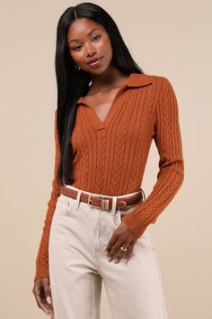 Cozy and cute, the Lulus Seasonal Classic Rust Brown Cable Knit Collared Sweater Top will be one of your favorite pieces to style all fall long! Stretchy cable knit shapes this sweet top that features a chic collared neckline, a fitted bodice, and long sleeves. Contrasting ribbed knit accents the cuffs and hem. Pair with a mini skirt and tights to create a comfy coquette-style look. Fit: This garment fits true to size. Length: Size medium measures 22" from shoulder to hem. Bust: Great for any cup size. Waist: Fitted - stretchy fabric allows custom fit. Undergarments: May be worn with any standard bra. Fabric: Fabric is very stretchy. Unlined. 50% Viscose, 28% Polyester, 22% Nylon. Hand Wash Cold. Do Not Bleach. Line Dry. Iron Low Heat. Imported. Lulus | Seasonal Classic Rust Brown Cable Kn Comfy Coquette, Mini Skirt And Tights, Skirt And Tights, Sweet Top, Collared Sweater, Coquette Style, Cable Knit Sweater, Fitted Bodice, Custom Fit