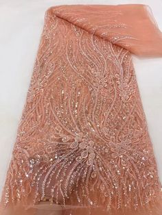 This high quality Fabric is measured in 5 Yards With Embroidered Beading and Sequin. It is soft, very delicate and beautiful. This high Quality Fabric is made with Fashion embroidered rhinestones can be used in making party wedding dresses, skirts, shawls, scarves and other other fashion apparels as you would like. Size : Length : 5 yards (180 inch). Width: 50 inch (Please allow slight deviation for the measurement data ,±1 inch) Material: 100% Polyester, Tulle Lace Fabric, Eco-Friendly embroidery African Fashion Design, Beaded Fabric, Beaded Lace Fabric, Beaded Tulle, Fabric Beads, Sequin Beading, Tulle Lace, Beaded Lace, Wedding Party Dresses