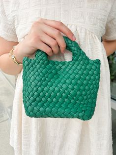 Elevate your style game with our BC Bags Emerald Braided Clutch. Expertly crafted with a stunning emerald braided design, this clutch is the perfect accessory to complement any outfit. With its versatile color, it's the perfect addition to your wardrobe. Make a statement of sophistication and elegance with this cute clutch! Large Tote sold separately. Large Tote, Fashion Forward, Emerald, Braids