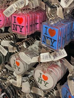 i love new york key chains and tags are on display at the ny state fair