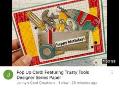 a hand holding up a card that has tools on it and the words pop up card features