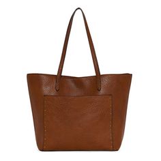 Stylish and practical, this a.n.a women's Kali tote bag ticks all the boxes. It's made from a cognac-colored faux leather and features bronze-tone hardware, inside slip and zip pockets, a front slip pocket for easy access, and a magnetic snap closure. Closure Type: Magnetic SnapPockets: 2 Inside Slip Pockets, 1 Inside Zip Pocket, 1 Front Slip PocketMetal Color: Bronze ToneMeasurements: 5.5 Depth/Inches, 17 Width/Inches, 12 Height/InchesHandle Drop Length: 9.75 InchesBase Material: 100% Faux Leat Trending Purses, Handbags Tote, Color Bronze, Large Bag, Tote Handbags, Cognac, Snap Closure, Tote Bags, Zip Pockets