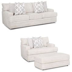 two white couches with pillows on them and a footstool next to each other