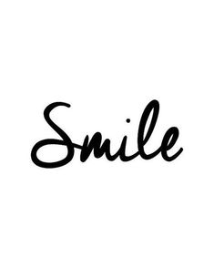 the word smile written in black ink on a white background