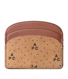 - Vegetable-tanned leather. - Suede split with the A.P.C. monogram. - Two card slots on each side. - One multifunction pocket in the center. - Rounded corners. - Embossed goldtone 'A.P.C. Rue Madame Paris' logo. C Monogram, Paris Logo, Candle Room, Faux Leather Bag, Backpack Tote Bag, Scarf Jewelry, Vegetable Tanned Leather, Tote Backpack, Weekender Bag