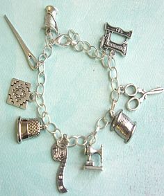 This charm bracelet features sewing inspired tibetan silver charms (nickel free). The charms are attached to a silver tone 7.5 inches chain bracelet. SKU 1486 Sewing Circles, Silver Charms, Chain Bracelet, Silver Tone, Charms, Charm Bracelet, Sewing, Bracelet, Chain