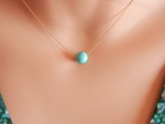 gold turquoise Necklace gold turquoise choker turquoise jewelry turquoise necklace pendant initial necklace turquoise pendant December birthstone A round natural turquoise color stone on a sterling silver 925 or gold vermeil (gold or rose gold plated over sterling silver 925) chain. A great necklace for summer that can be layered with other necklaces! This necklace is so beautiful and you can wear it on your vacation and it looks great on tanned skin! Imagine yourself feeling beautiful in your b Elegant Turquoise Necklace With Round Beads As Gift, Dainty Turquoise Pendant Necklace, Elegant Turquoise Pendant Charm Necklace, Dainty Turquoise Necklace For Gift, Dainty Yellow Gold Turquoise Necklace For Gift, Turquoise Charm Necklaces With Round Beads As Gifts, Turquoise Necklace For Everyday Elegance, Minimalist Turquoise Charm Necklace For Gift, Yellow Gold Turquoise Necklace With Round Beads As Gift