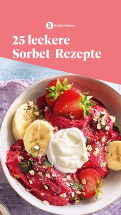 a bowl filled with fruit and yogurt on top of a purple table cloth