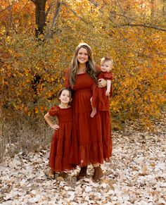 ITEM DESCRIPTION Get ready for fall family outings with our adorable matching dresses! Designed for comfort and style, these dresses are perfect for cozy pumpkin patches, festive gatherings, family fall pictures or simply enjoying the crisp autumn air together. 🍁💖Swipe to see all the beautiful details and color that will make this season extra special! DETAILS: Fit type: True to size Color: Rust-Brown Fit Style: Long Tiered Dress Flowy Length: Calf Long Dress Material: 100% Polyester Versatile tie bow that can be used in the front or back This dress includes lining Front and back smocked bodice Accessories not included SIZING ADULT S: Chest 30" | Waist 24.4"| Length: 39.8"| Sleeve length: 15" M: Chest 31.5" | Waist 26.4"| Length: 40.7"| Sleeve length: 15.3" L: Chest 33" | Waist 28.4"| Le Family Fall Pictures, Long Tiered Dress, Mommy Daughter Photos, Fall Family Photo Outfits, Mama And Mini, Get Ready For Fall, Family Outings, Pumpkin Patches, Mommy And Me Dresses