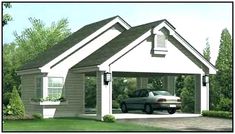 a car is parked in front of a house that has a garage on the side