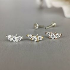 This is a set of a mini CZ crescent ear piercing jewelry removable end, which has three AAA CZ diamonds prong setting, with a threadless push back post.RECOMMENDED WEARING POSITIONEAR PIERCING- Helix, Earhead/Forward Helix- Tragus, Anti-Tragus/Surface Tragus- Cartilage/Flat - Conch, Inner Conch, Outer Conch- Lobe/Standard Lobe, Upper LobeMATERIAL- AAA Cubic Zirconia- 925 sterling silver with gold/rose gold plated- 925 sterling silver threadless push back postMEASUREMENT* Removable End Size:-- Ap Tiny Cubic Zirconia Cartilage Earrings For Everyday, Minimalist White Piercings For Anniversary, Silver Curved Barbell Cartilage Earrings, Nickel Free Curved Barbell Jewelry As Gift, Minimalist Internally Threaded Cubic Zirconia Piercings, Nickel-free Curved Barbell Jewelry As Gift, Anniversary Rose Gold Sterling Silver Piercings, Tiny Round Cartilage Earrings For Anniversary, Delicate Sterling Silver Internally Threaded Cartilage Earrings