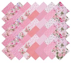 pink and white patchwork quilts with flowers on them