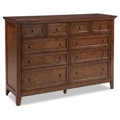 a large wooden dresser with many drawers