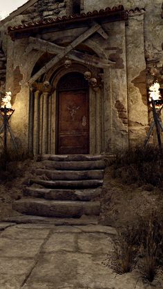 an old stone building with steps leading up to the door and lights on either side