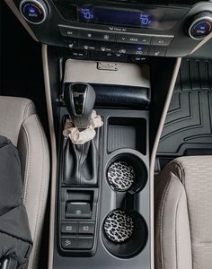 the interior of a car with an automatic gear box