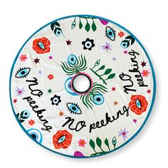 a white and blue flowered disc with the words happy birthday on it's center