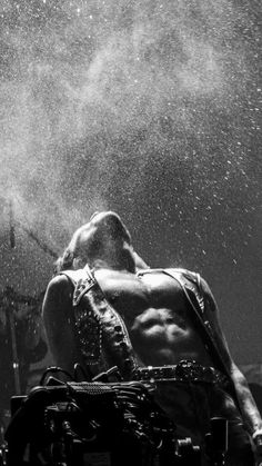 black and white photograph of a man in the shower