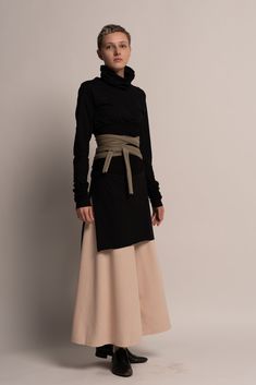 "These extremely beautiful Stylish and comfortable black flare skirt pants are a great addition to any wardrobe. The cut is diagonal which gives the pants a great fall and luxurious look . The fabric is stretchable and very soft on the body, which gives it a range in size. ONE SIZE! TOP PART: width: 75cm / 29.5\" inches height: 10cm/ 4\" inches PANT LEGNTH: Top to bottom 88cm / 34.5\" inches MATERIAL : High quality jersey COLOR: Black Available also in cream color Care instructions: - Turn garme Black Pants With Flared Hem For Fall, Fitted Black Wide Leg Pants With Flared Hem, Black Fitted Wide Leg Pants With Flared Hem, Skirt With Pants Underneath, Bohemian Sash, Boho Flare Pants, Pants Bell Bottoms, Black Flare Skirt, Pants Cream