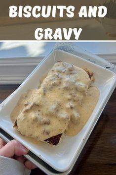 a person holding a plate with food on it and the words biscuits and gravy