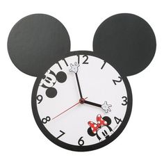 a mickey mouse clock with the numbers six to twelve on it's face is shown