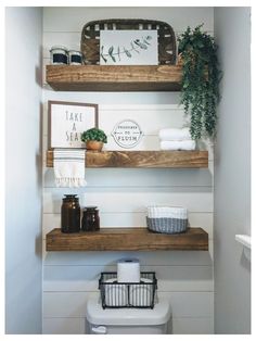 the bathroom is clean and ready to be used as a place for towels, toilet paper, and other items