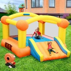 an inflatable bounce house with a child on it