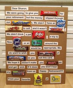 a bulletin board with candy bars on it and some words taped to the wall behind it