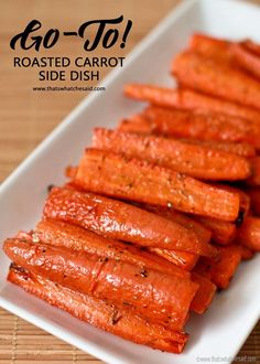 roasted carrots on a white plate with the words go - to roasted carrot side dish