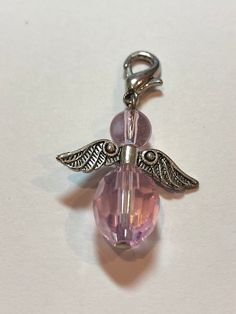 This creation features a 22mm Crystal Guardian Angel charm/pendant with a lobster claw attachment. This makes for a perfect gift for that special someone. Great for birthdays, bridesmaids, thank you's, congratulations, thinking of you, graduation, mother's day, Christmas, Hanukkah and/or any other special occasion. For an added cost we can also ship your package express post, please advise us if you would like this option and then a tracking number will be issued to you. Nickel-free Pink Charms As Gift, Nickel-free Pink Charms For Gift, Nickel-free Pink Charms, Pink Dangle Charms For Gifts, Nickel-free Round Beads Charms For Gifts, Pink Pendant Charms For Gifts, Pink Charms With Lobster Clasp For Jewelry Making, Guardian Angel Necklace, Crystal Angel