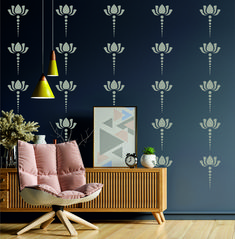 a living room scene with focus on the chair and wallpapered walls behind it