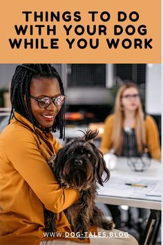 a woman sitting at a table with a dog in her lap and the caption reads things to do with your dog while you work