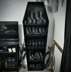 there are many pairs of shoes on the shelves