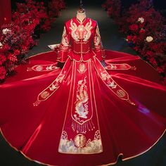 This stunning Qun Kwa is a traditional Chinese wedding dress, featuring a rich red color that symbolizes good luck, happiness, and prosperity. The dress is intricately embroidered with golden phoenix motifs, which are symbols of femininity, grace, and harmony in Chinese culture. Made from satin fabric, ensuring both comfort and elegance. Pair it with a dragon tang suit (ma gua), representing the perfect balance between yin and yang Size Guide: Please refer to the size guide picture before placin Traditional Floor-length Wedding Dress, Gold Gown With Pallu For Traditional Ceremonies, Traditional Festive Wedding Dress, Traditional Floor-length Embroidered Wedding Dress, Embroidered Floor-length Wedding Dress For Traditional Ceremonies, Traditional Gold Embroidered Gown, Traditional Wedding Dress For Ceremonies, Traditional Wedding Dress With Zari Work For Ceremonies, Traditional Floor-length Wedding Dress With Intricate Embroidery