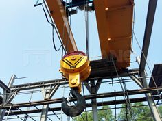 a crane is lifting something off the ground