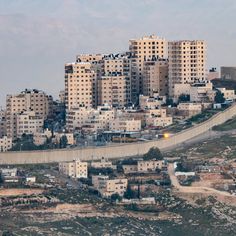 a city with lots of tall buildings on top of it