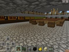 the inside of a minecraft building with several tables and benches